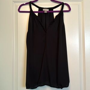 Sleeveless nylon top with elastic bottom, size L
